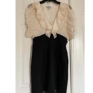 Length - 34”
Width from Underarm to Underarm - 15” 
Width at Waist - 14.5”